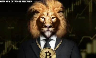 a lion wearing a suit and a CryptoBusinessNewsTips.com necklace