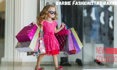 Barbie Fashionistas Barbie girl in a pink dress holding shopping bags